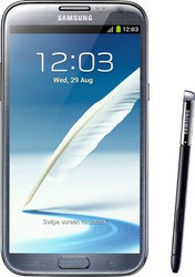 The Samsung Galaxy Note II is a titanium gray colored smartphone runni